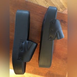 Black leather platform slides